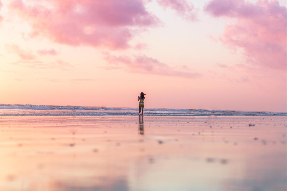 woman-walking-on-wet-sand.jpg